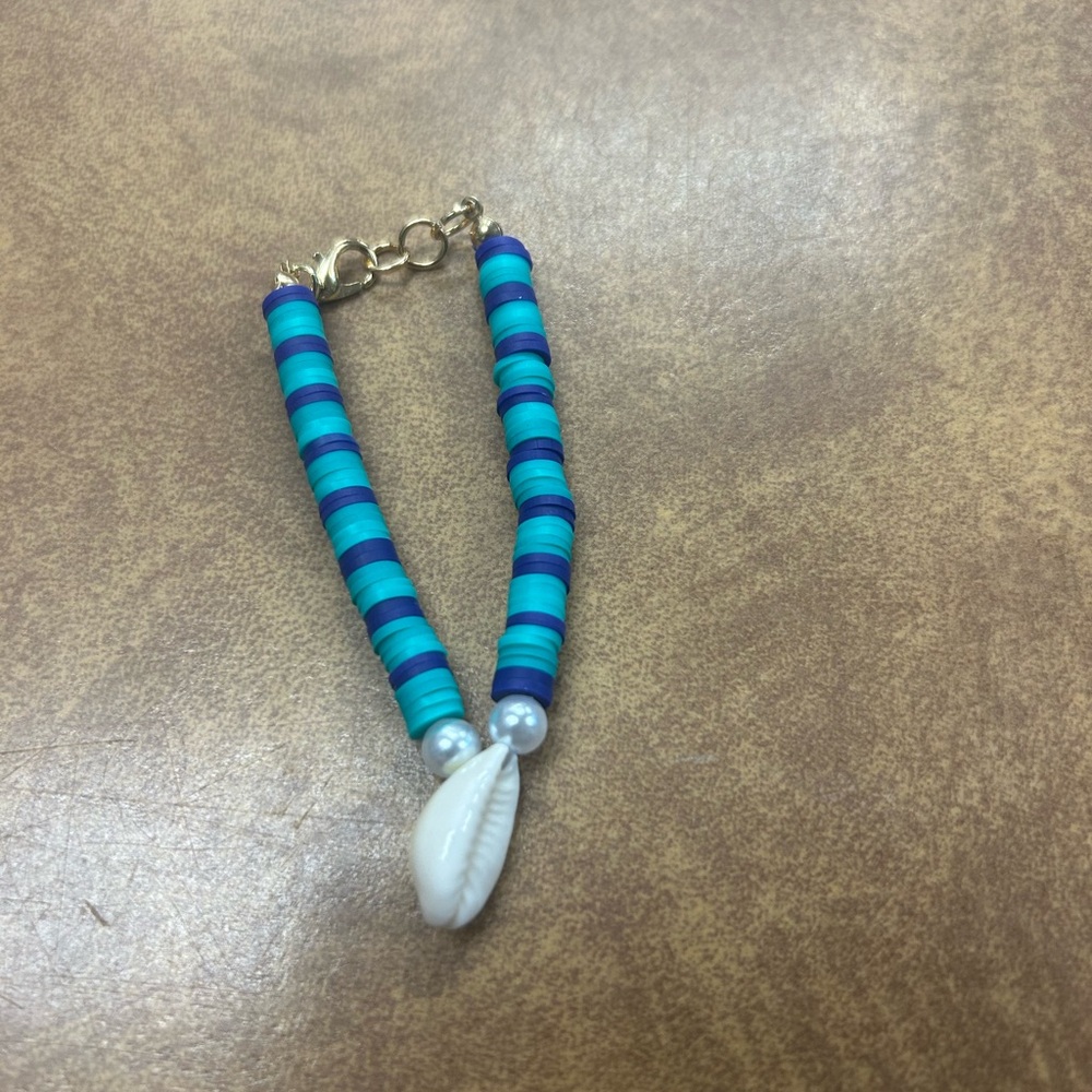 Blue and White Beaded Bracelet with Shell Charm